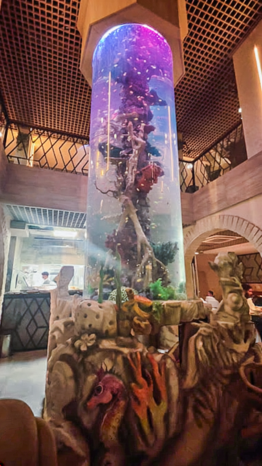 Khan Al-Rayhan signature cylindrical aquarium centerpiece